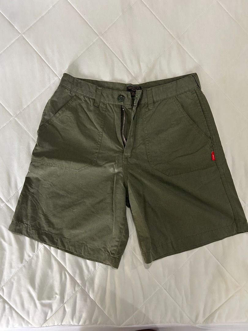 WTAPS Shorts (Category: Shorts) located in Manila. Submitted by decluttteringz (Listing ID 1394611312, Image 1). Description: - WTAPS green shorts - Button and zipper closure - Multiple pockets - WTAPS label detail - Straight cut - Durable fabric.