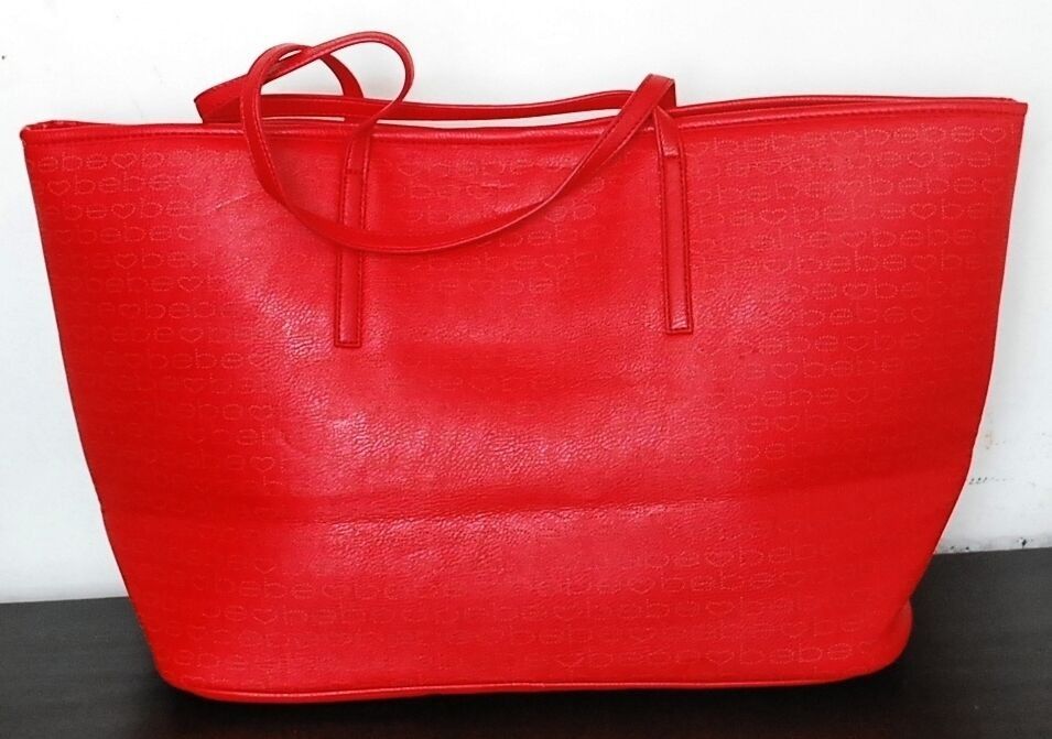 30% Discount Authentic Bebe Lisa Tote Bag (Category: Tote Bags) located in Paranaque City. Submitted by vanitelab (Listing ID 1394824479, Image 2). Description: CLEARANCE SALE LESS 30% (3,400 - 1,020 = 2,380) Authentic and Brand-new BEBE LISA TOTE includes care card Product Description: Material: Shell Polyurethane, Interior Polyester Color: Red Opening: Top-snap Interior: 1 zipped pocket, multiple open pockets Size: (bottom 16.25), top (22.5) x 