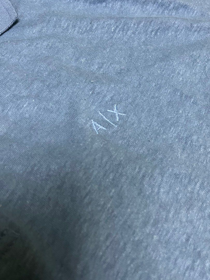 Armani Exchange Blue poloshirt (Category: Tshirts & Polo Shirts ) located in Manila. Submitted by ashrc (Listing ID 1394869757, Image 3). Description: Original Armani Exchange Blue Polo Shirt Issue : Very small pinhole beside size tag (cannot be seen kase natatakpan ng kwelto) Slightly negotiable Size: Medium AX - L26x W20.
