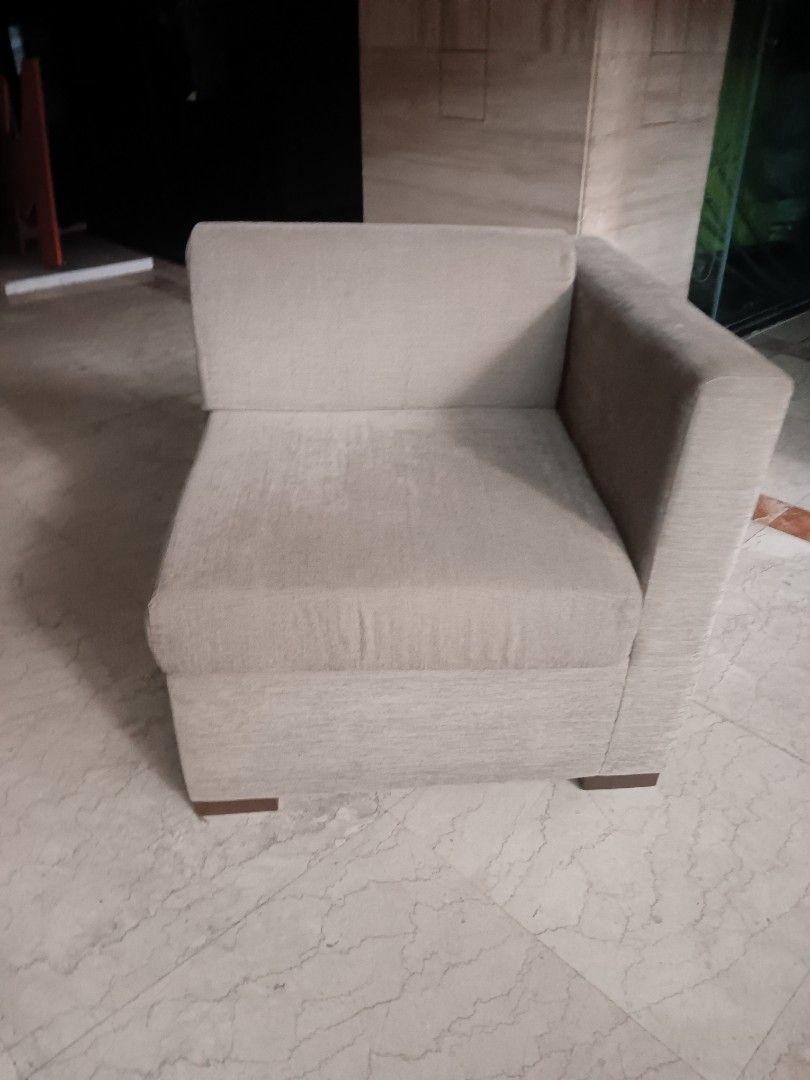 Beige Sectional Sofa (Category: Sofas) located in Las Pinas. Submitted by jesus1smysavi0r (Listing ID 1394892990, Image 2). Description: SALE!!! - Modern beige sectional sofa - Soft fabric - Two-piece configuration with corner piece - Dark wood legs - Ideal for living rooms.