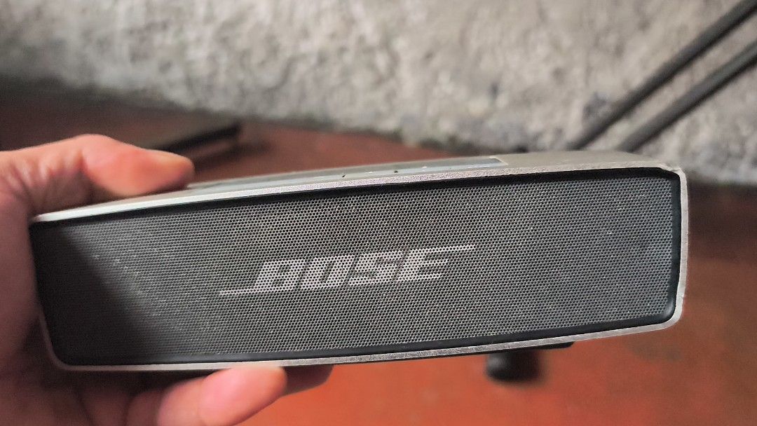 Bose SoundLink Bluetooth Speaker (Category: Soundbars, Speakers & Amplifiers) located in Quezon City. Submitted by herrera_jekjek (Listing ID 1394830392, Image 1). Description: - Bose SoundLink Bluetooth speaker - Silver top with black speaker grill - Features power, volume, and AUX buttons - Bose logo prominently displayed - In excellent working condition.