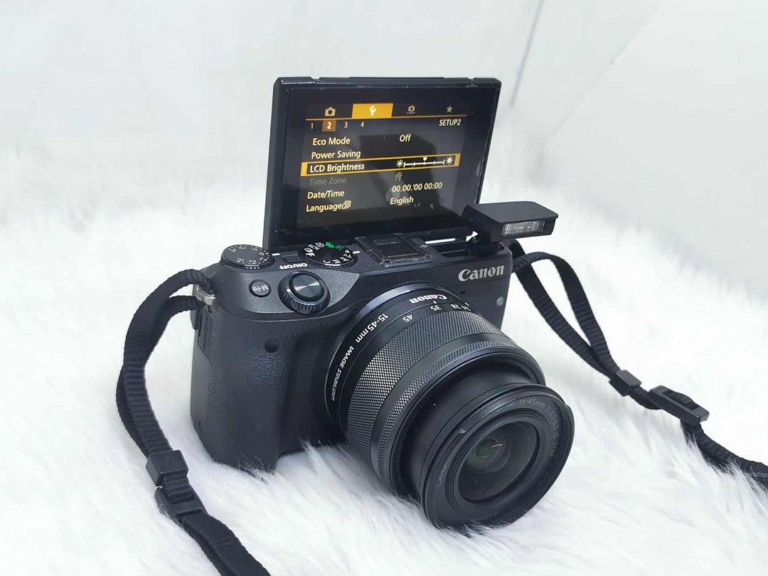 Canon EOS M3 Mirrorless Camera with Lens (Category: Cameras) located in Manila. Submitted by jonrick.co (Listing ID 1394847922, Image 3). Description: - Canon EOS M3 mirrorless camera with 15-45mm lens - Flip-out LCD screen - Built-in flash - Wi-Fi enabled - Includes camera strap - Features: Eco Mode, LCD Brightness settings LAST PRICE NO COD IWASAN ANG KULITAN.