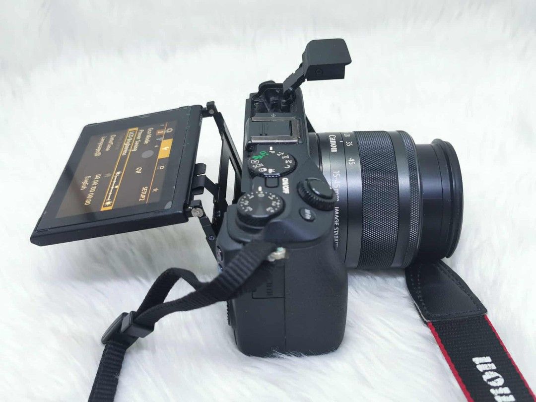 Canon EOS M3 Mirrorless Camera with Lens (Category: Cameras) located in Manila. Submitted by jonrick.co (Listing ID 1394847922, Image 2). Description: - Canon EOS M3 mirrorless camera with 15-45mm lens - Flip-out LCD screen - Built-in flash - Wi-Fi enabled - Includes camera strap - Features: Eco Mode, LCD Brightness settings LAST PRICE NO COD IWASAN ANG KULITAN.