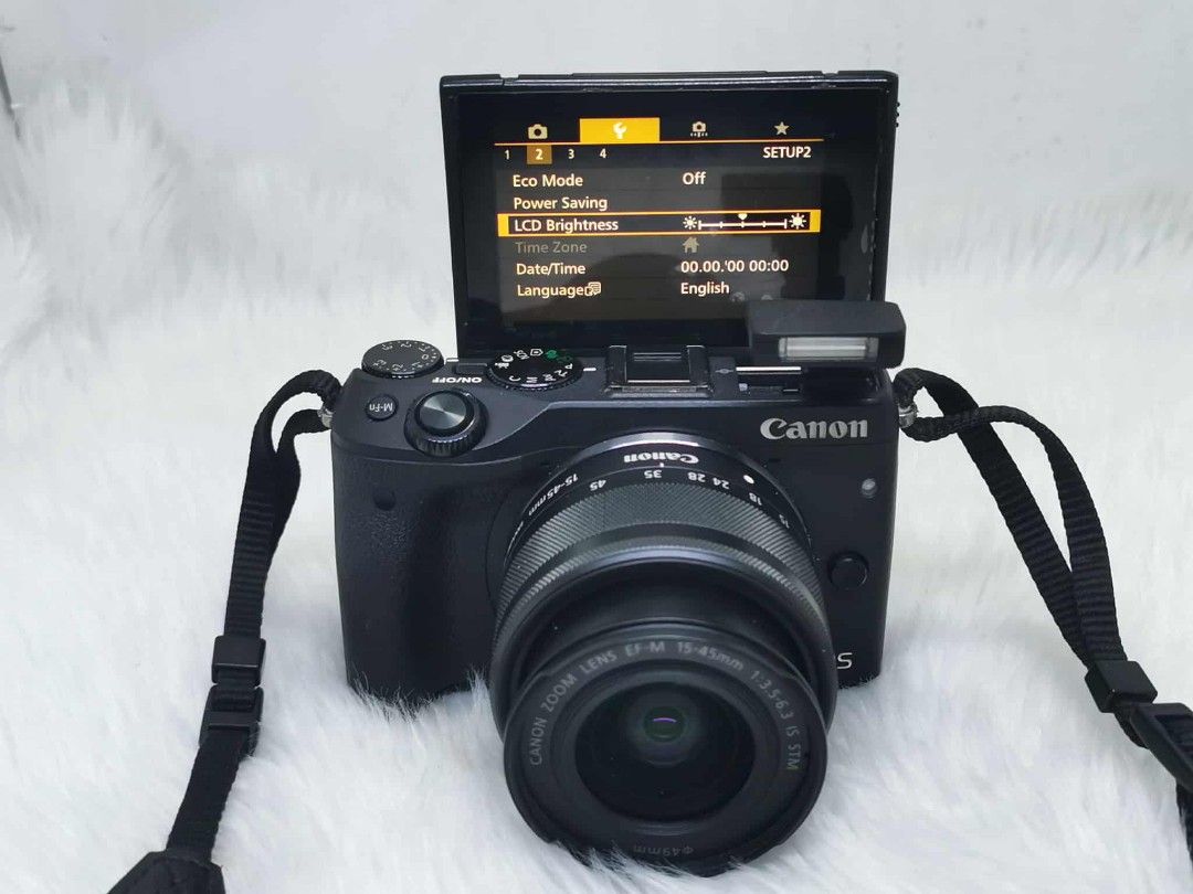 Canon EOS M3 Mirrorless Camera with Lens (Category: Cameras) located in Manila. Submitted by jonrick.co (Listing ID 1394847922, Image 1). Description: - Canon EOS M3 mirrorless camera with 15-45mm lens - Flip-out LCD screen - Built-in flash - Wi-Fi enabled - Includes camera strap - Features: Eco Mode, LCD Brightness settings LAST PRICE NO COD IWASAN ANG KULITAN.