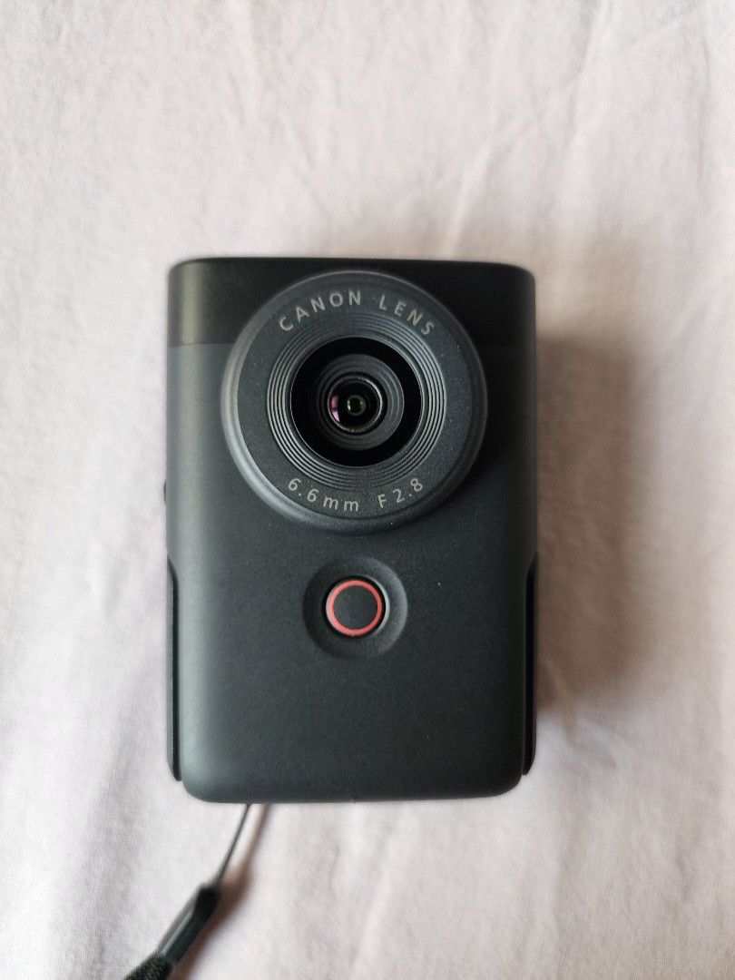 Canon V10 (Category: Cameras) located in Pasig City. Submitted by RainbowPocket (Listing ID 1394842628, Image 1). Description: - Canon v10 camera - Built-in flip screen - 6.6mm f/2.8 lens - Sleek black body - Includes wrist strap Condition: lightly used Rfs:Decluttering .