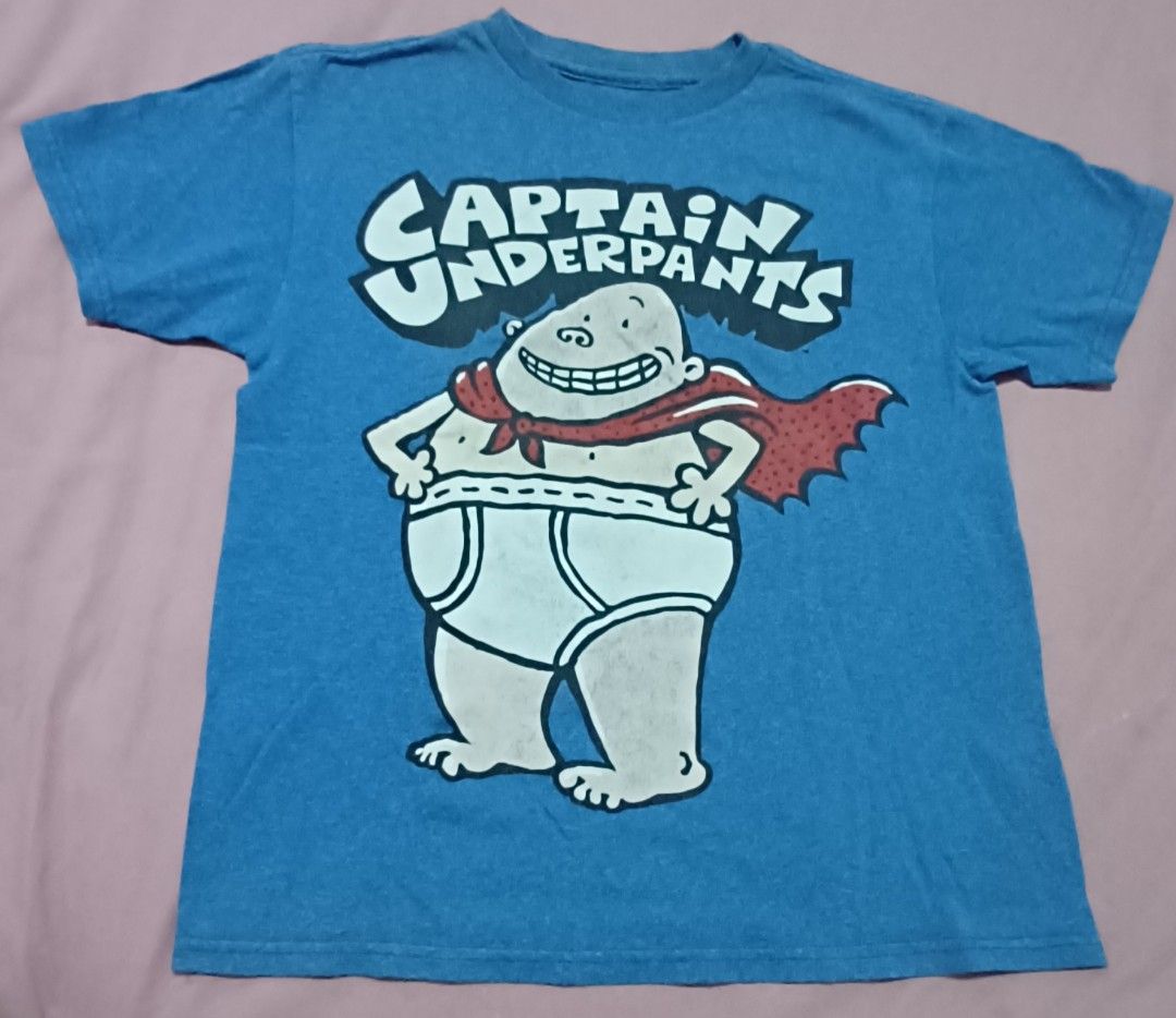 Captain Underpants T-shirt - Size S (Category: Babies & Kids Fashion) located in Quezon City. Submitted by wjmae (Listing ID 1394820726, Image 1). Description: - Captain Underpants graphic on the front - Size: S - Material: 50% cotton, 50% polyester - Made in Honduras - Care instructions: Machine wash cold, tumble dry low. Do not iron or dry clean..