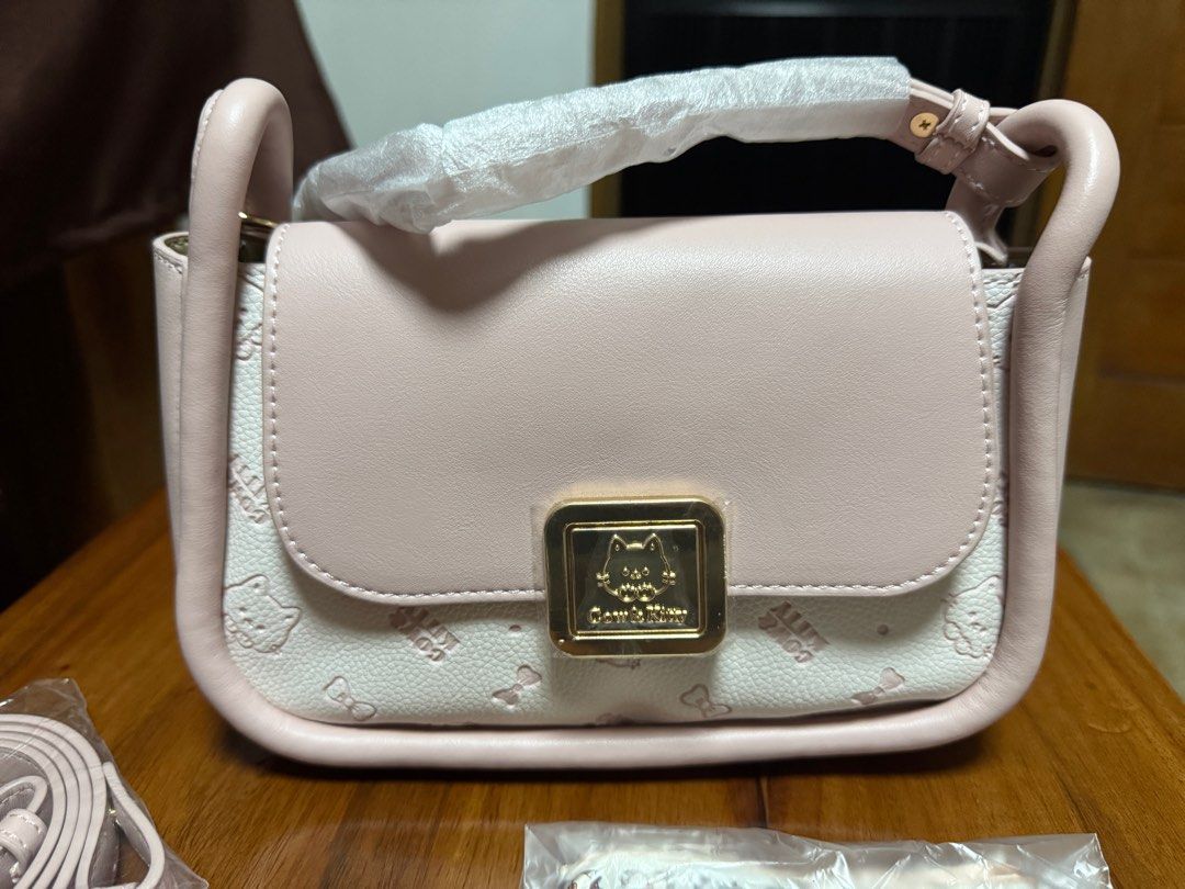 COW AND KITTY SLING OR KILI BAG (Category: Shoulder Bags) located in Manila. Submitted by akdadigital (Listing ID 1394853951, Image 2). Description: small shoulder bag or sling bag with twilly cow and kitty cute.