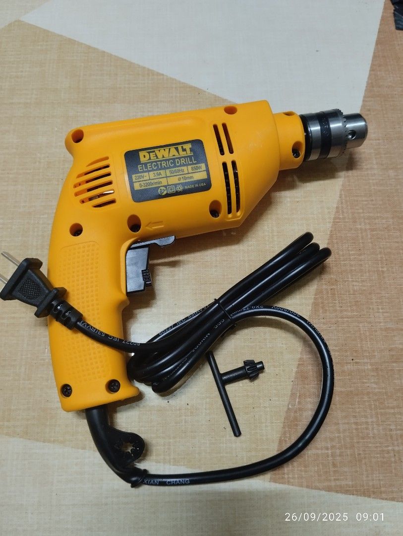 DeWALT Electric Drill (Category: Construction Tools & Equipment) located in Manila. Submitted by acgprinting08798 (Listing ID 1394831634, Image 1). Description: - DeWALT electric drill -850w -Brandnew - Yellow body - Black power cord - Includes chuck and trigger - Features specifications label - In good working condition .