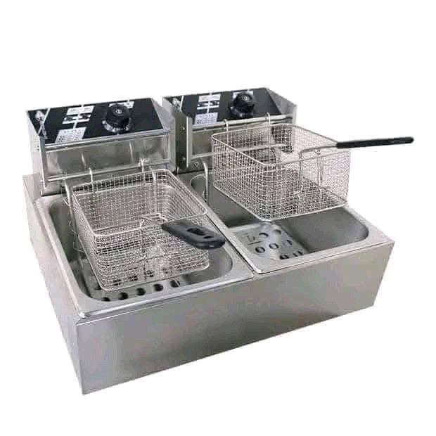 double pan fryer (Category: Fryers) located in Manila. Submitted by asstditems (Listing ID 1394849646, Image 2). Description: 2390 DOUBLE DEEP FRYER 📌 SIZE ： 56 CM X 45 CM X 30 CM Same day delivery via Lalamove Location: Manila Mop: Cod/Gcash payment.