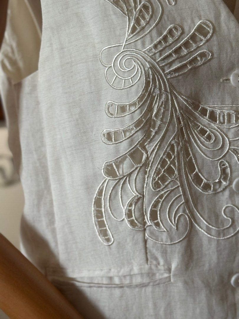 Embroidered Linen Vest (Category: Sleeveless) located in Davao. Submitted by kitdlr (Listing ID 1394849280, Image 3). Description: - Linen vest with embroidered detailing - V-neck design - Button-up closure - Two front pockets - Tailored fit - Plain linen back - Stylish for layering or wearing alone.