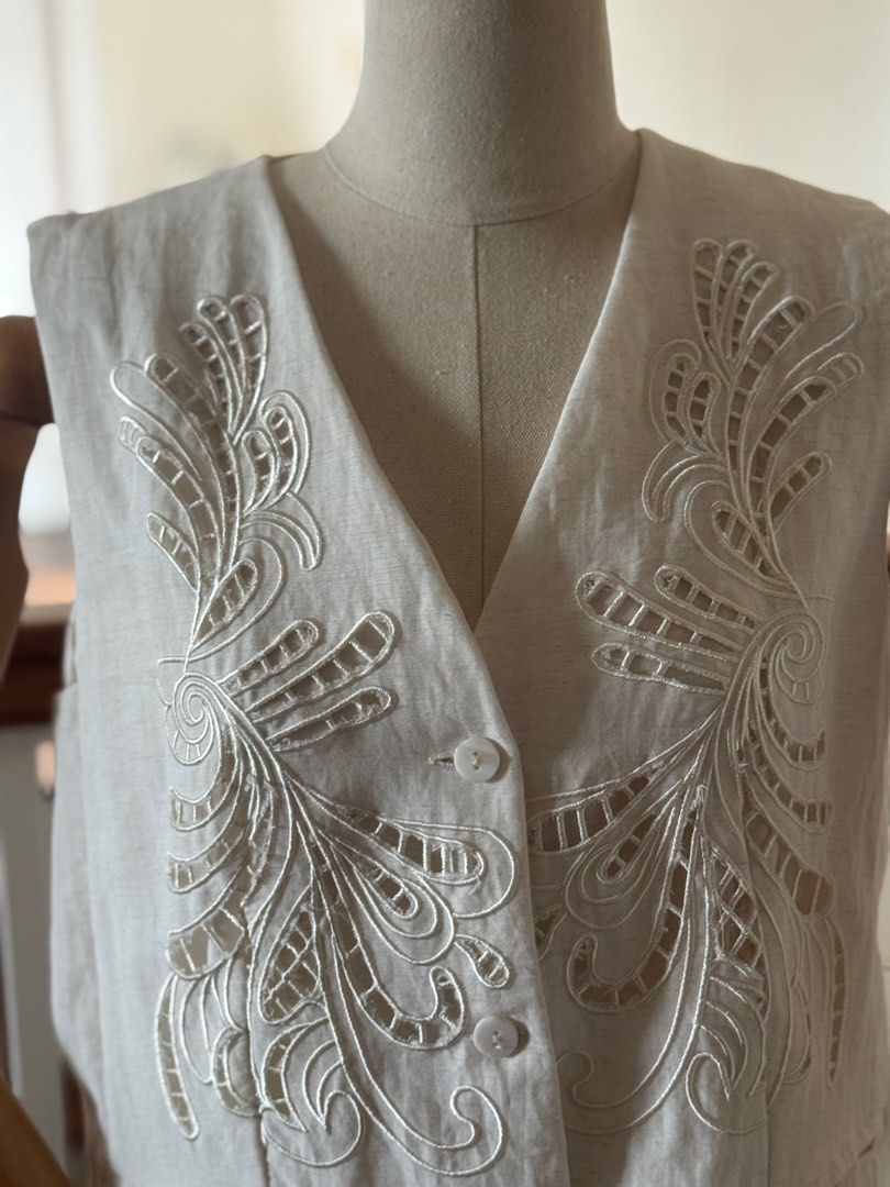Embroidered Linen Vest (Category: Sleeveless) located in Davao. Submitted by kitdlr (Listing ID 1394849280, Image 2). Description: - Linen vest with embroidered detailing - V-neck design - Button-up closure - Two front pockets - Tailored fit - Plain linen back - Stylish for layering or wearing alone.