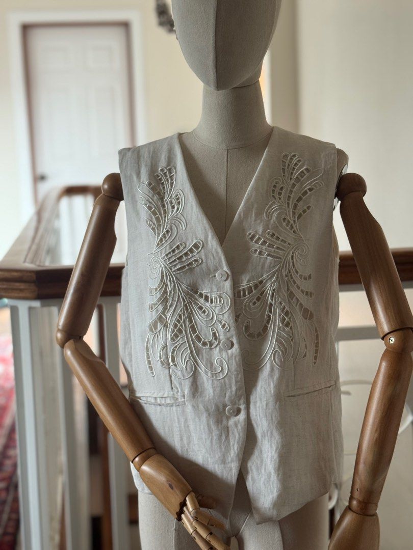 Embroidered Linen Vest (Category: Sleeveless) located in Davao. Submitted by kitdlr (Listing ID 1394849280, Image 1). Description: - Linen vest with embroidered detailing - V-neck design - Button-up closure - Two front pockets - Tailored fit - Plain linen back - Stylish for layering or wearing alone.