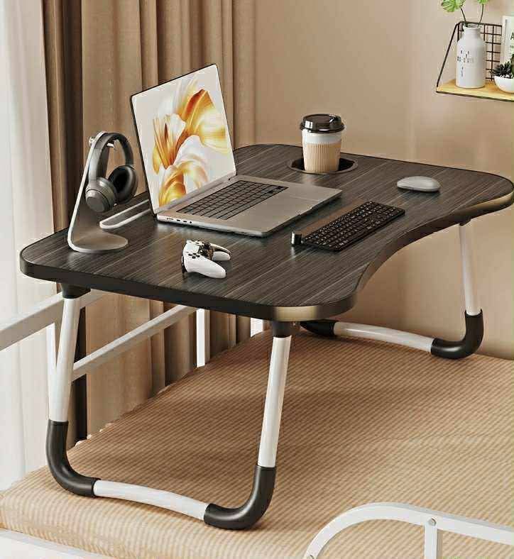 Foldable Laptop Table with Cup Holder (Category: Tables & Sets) located in Manila. Submitted by yzcartph (Listing ID 1394893804, Image 3). Description: - Foldable laptop table - Perfect for bed or couch - Built-in cup holder - Tablet/phone slot - Lightweight and portable - Easy storage - Available in multiple colors.