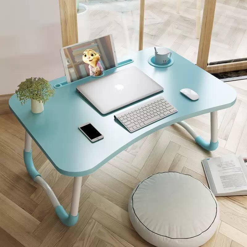 Foldable Laptop Table with Cup Holder (Category: Tables & Sets) located in Manila. Submitted by yzcartph (Listing ID 1394893804, Image 2). Description: - Foldable laptop table - Perfect for bed or couch - Built-in cup holder - Tablet/phone slot - Lightweight and portable - Easy storage - Available in multiple colors.