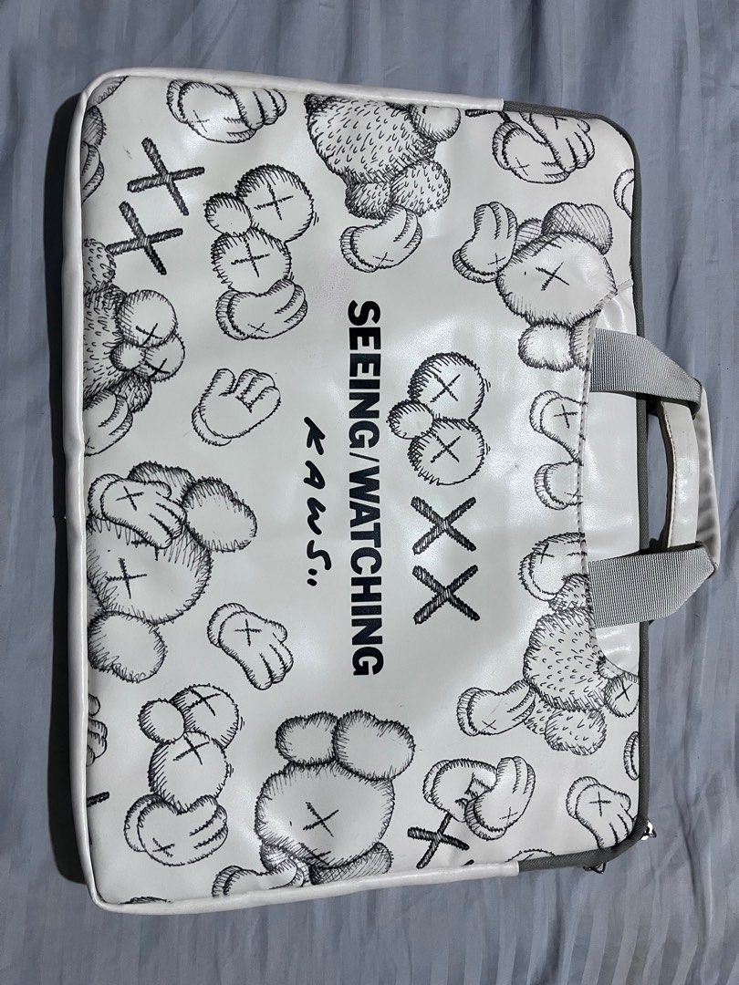 Kaws laptop sleeve/ bag (Category: Laptops & Notebooks) located in Angeles City. Submitted by ritenianstuff (Listing ID 1394885154, Image 1). Description: Kaws Japan Laptop macbook bag May mga konting issues check photos po Mantsa s may hidden part ng bag at strap Kaya po mura n Lp posted free shipping n GCash payment .