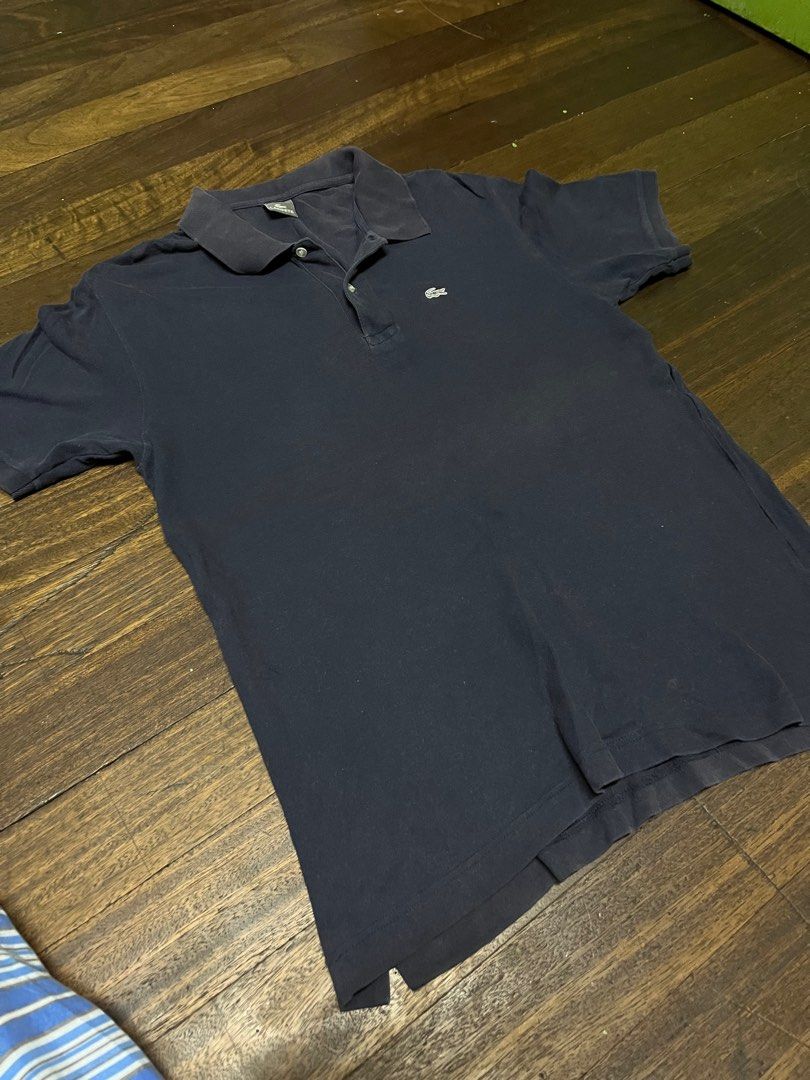 Lacoste Polo shirt (Category: Tshirts & Polo Shirts ) located in Manila. Submitted by ashrc (Listing ID 1394870684, Image 1). Description: Original Lacoste Polo Shirt Color - 7/10 No pinholes Size: L lacoste - L28 x W21 Slightly negotiable.
