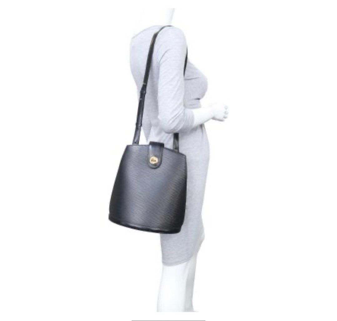 Louis Vuitton Epi Leather Bucket Bag (Category: Luxury Bags & Wallets) located in Makati City. Submitted by martinoloco (Listing ID 1394903837, Image 3). Description: - Authentic Louis Vuitton bucket bag - Crafted from structured Epi leather - Stunning blue exterior - Secure top flap closure with gold-tone clasp - Adjustable shoulder strap - Subtle LV logo embossing - Stylish and functional design - Ideal for daily use - DM me for more photos - c