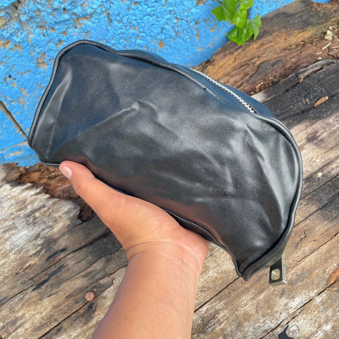 Marc Jacobs Men's Dopp Kit Toiletry Leather Bag (Category: Belt bags, Clutches and Pouches) located in Zamboanga. Submitted by thriftbyeems (Listing ID 1394811172, Image 3). Description: WTS Marc Jacobs Men’s Dopp Kit Toiletry Leather Bag Silver hardware Zippered closure Preloved, very nice good condition Small zipper pocket on the front 10 inches long 3.5 inches width 5.5 inches height PM.