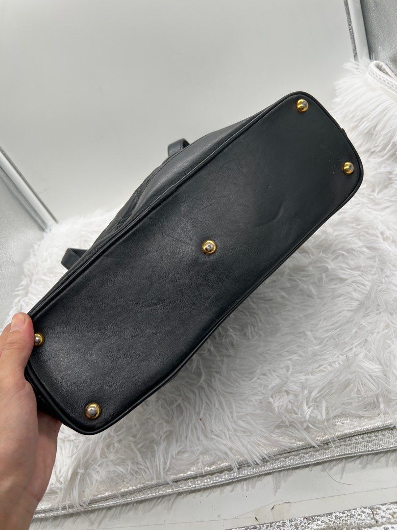 MCM Germany quilted leather black shoulder tote bag (Category: Tote Bags) located in Kawit. Submitted by aellavier2 (Listing ID 1394957821, Image 3). Description: needs cleaning inside. vintage preloved signs of use. feel free to zoom in pics .