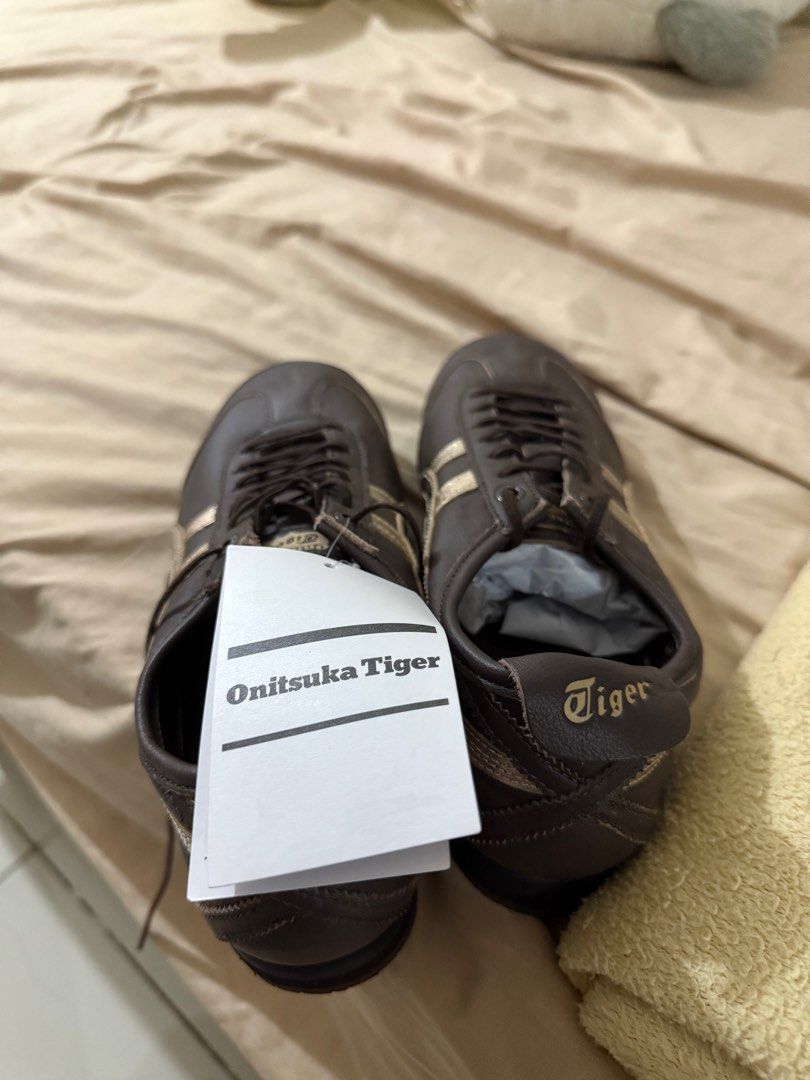 Mexico 66 SD Licorice (Category: Sneakers) located in Manila. Submitted by declutterbyv (Listing ID 1394821002, Image 3). Description: Onitsuka Tiger Mexico 66SD in Licorice Brown - brand new, never been worn - clean sole - with box, paper bag, and tag - bought from Osaka, Japan - idk if I still have the receipt ill look for it - size US 5 - rfs: not my size.