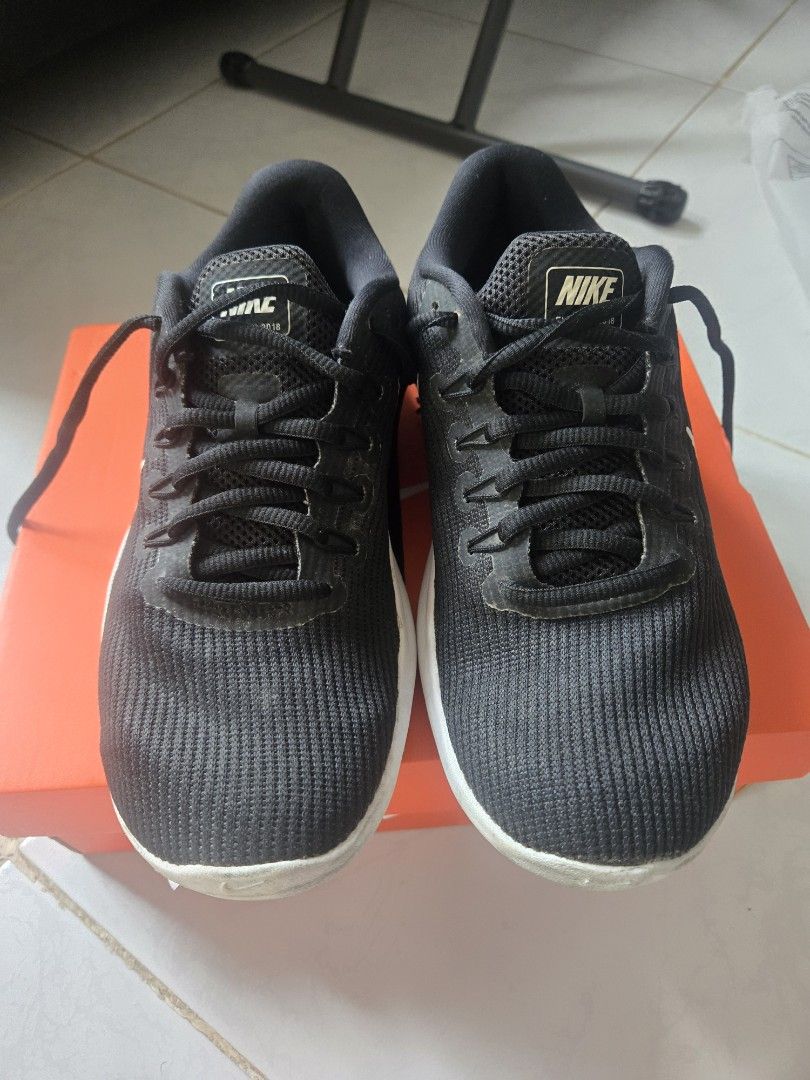 Nike Wmns Asuna Slide Sneakers (Category: Sneakers) located in Santa Rosa. Submitted by statempire (Listing ID 1394835330, Image 3). Description: - Nike Wmns Asuna Slide sneakers - Black upper with white Nike swoosh - White sole with black honeycomb pattern - Size: US 8.5, EUR 39.5, CM 25.5 - Includes original orange box.