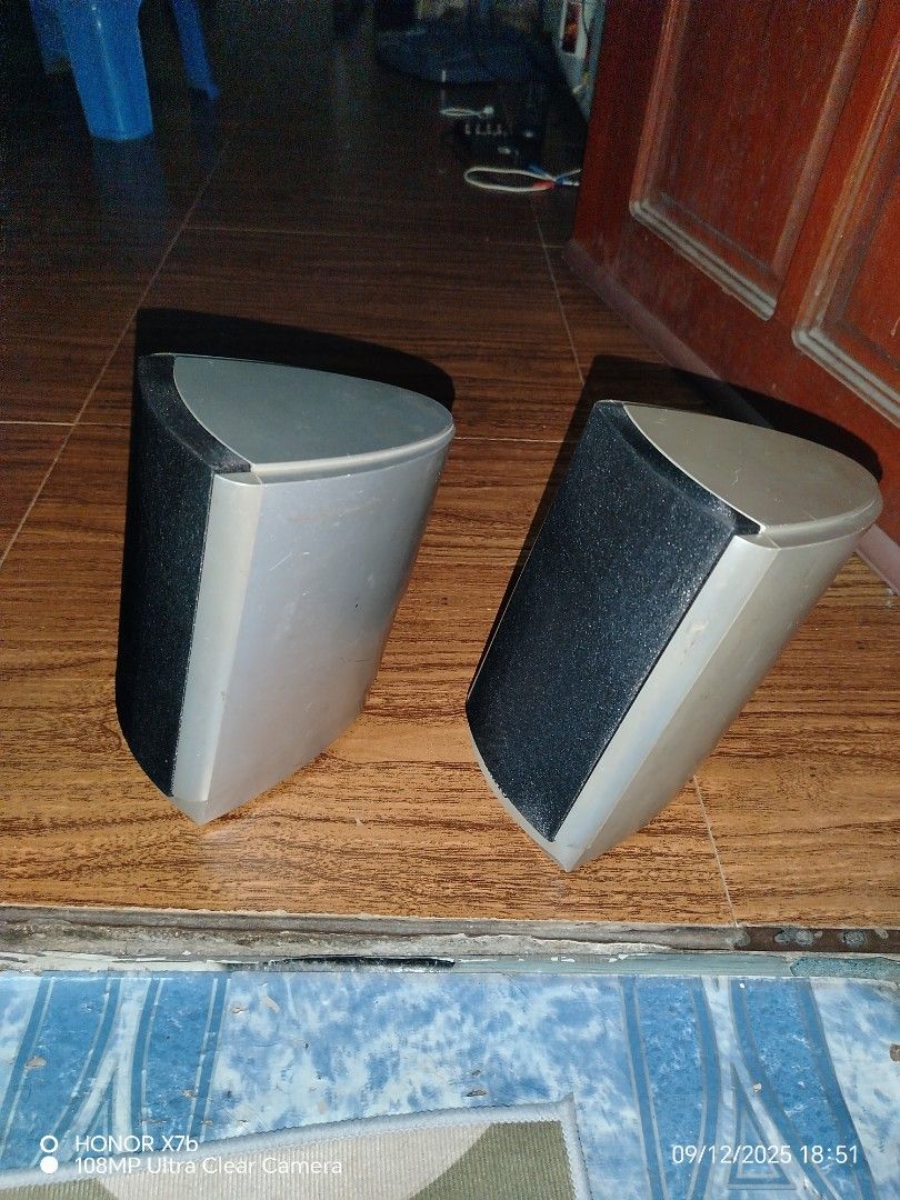 Onkyo D-T2 2Way Speakers (Category: Soundbars, Speakers & Amplifiers) located in Valenzuela. Submitted by henbaluyan (Listing ID 1394863043, Image 3). Description: Pair of Onkyo D-T2 2Way speakers. Features a silver finish with black speaker covers. The back of the speakers show the connection terminals and model information. Includes two speakers and two speaker covers. The speakers have a unique angled design. Php1,050 nalang Valenzuela City Lo