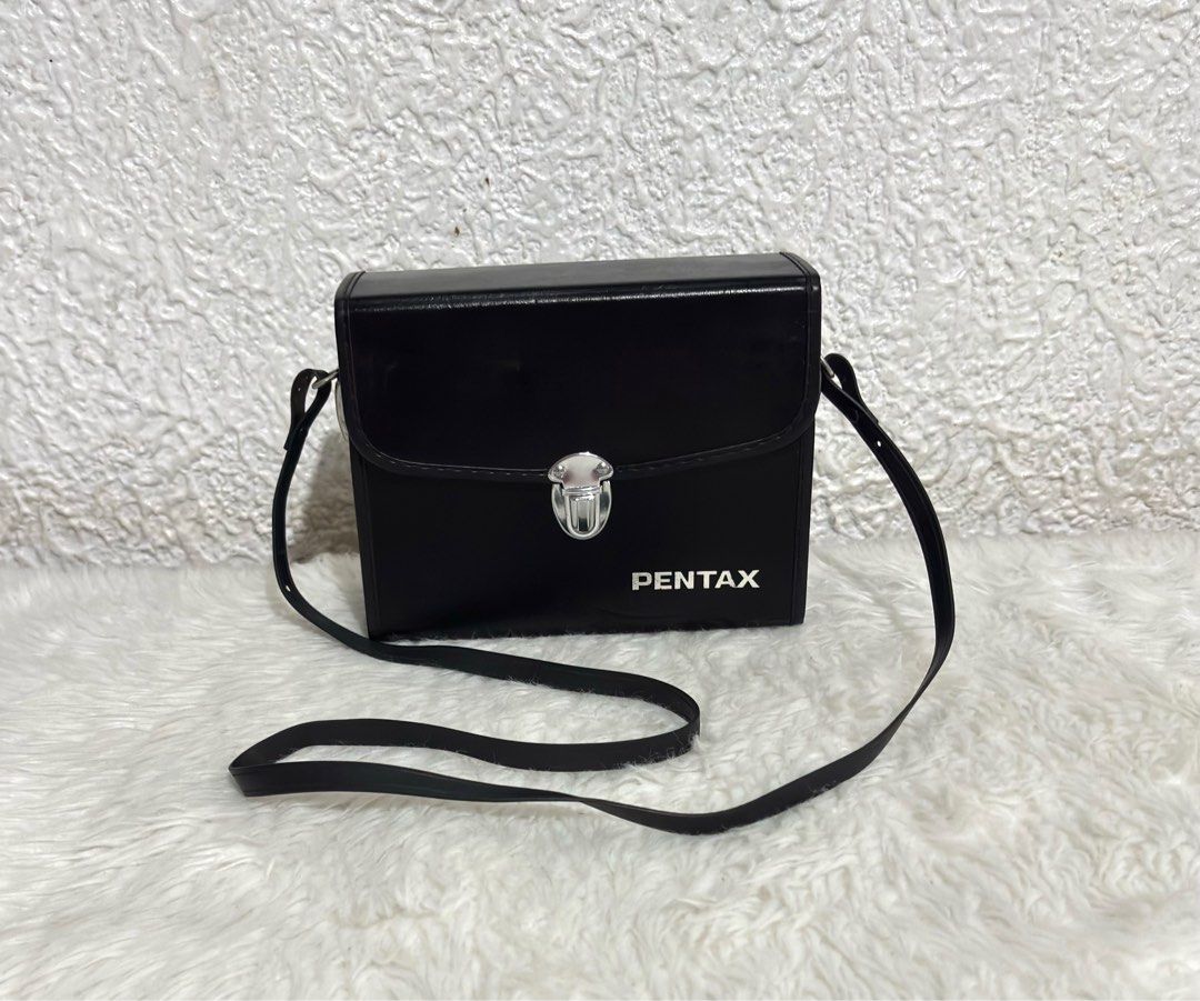 Pentax Carrying Case Made in Japan (Category: Camera Bags & Carriers) located in Paranaque City. Submitted by dalle_closet (Listing ID 1394814007, Image 1). Description: Size: 7 x 5.3 inches Made in Japan Slightly used pa. May pressmarks lang.