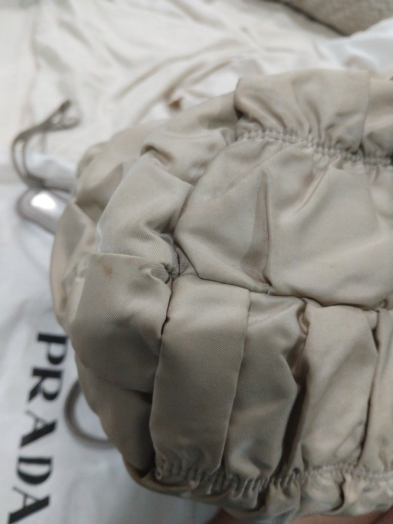 Prada Grey Gathered Handbag with Shoulder Strap (Category: Luxury Bags & Wallets) located in Caloocan City. Submitted by fiercehorse_88d3ce (Listing ID 1394879908, Image 3). Description: not using anymore rfs :decluttering .