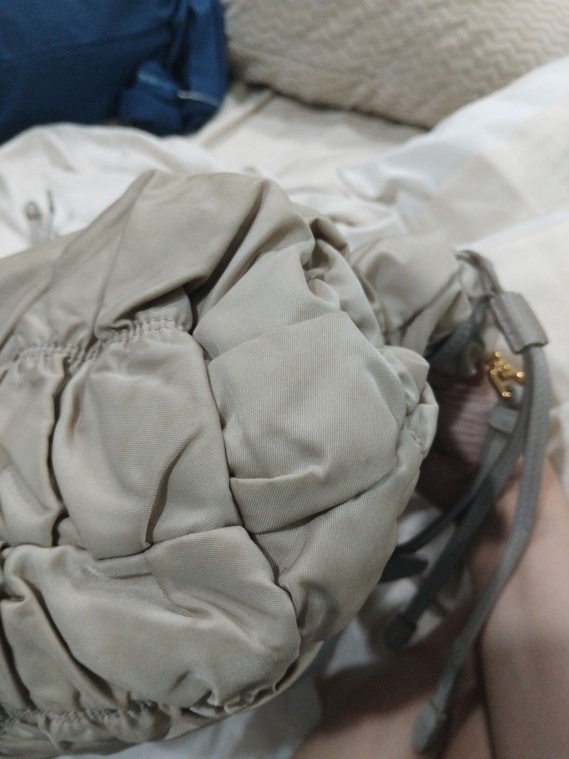 Prada Grey Gathered Handbag with Shoulder Strap (Category: Luxury Bags & Wallets) located in Caloocan City. Submitted by fiercehorse_88d3ce (Listing ID 1394879908, Image 2). Description: not using anymore rfs :decluttering .