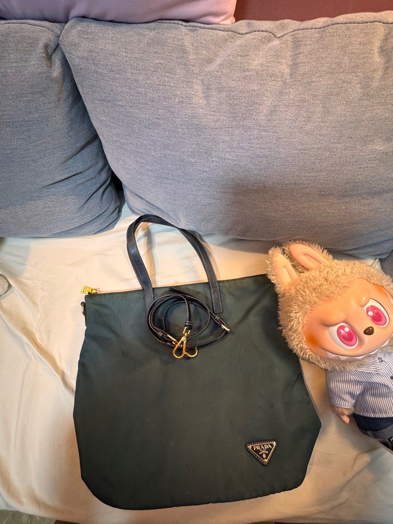 Prada Nylon 2-Way (Category: Luxury Bags & Wallets) located in Bacoor. Submitted by mommyjameetan (Listing ID 1394822482, Image 2). Description: Authentic. Prada 2 way bag: Shoulder bag with sling..