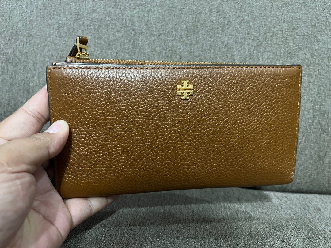 PRELOVED! Tory Burch Blake Color Block Slim Wallet (Category: Luxury Bags & Wallets) located in San Pedro. Submitted by misslumi (Listing ID 1394896722, Image 1). Description: Bought from Canada-based shopper. Used for a short time - good as new. Includes original packaging, tag and gift receipt. Please see photos. Cortado (Brown) / Pink Moon color. Very nice color combination! .