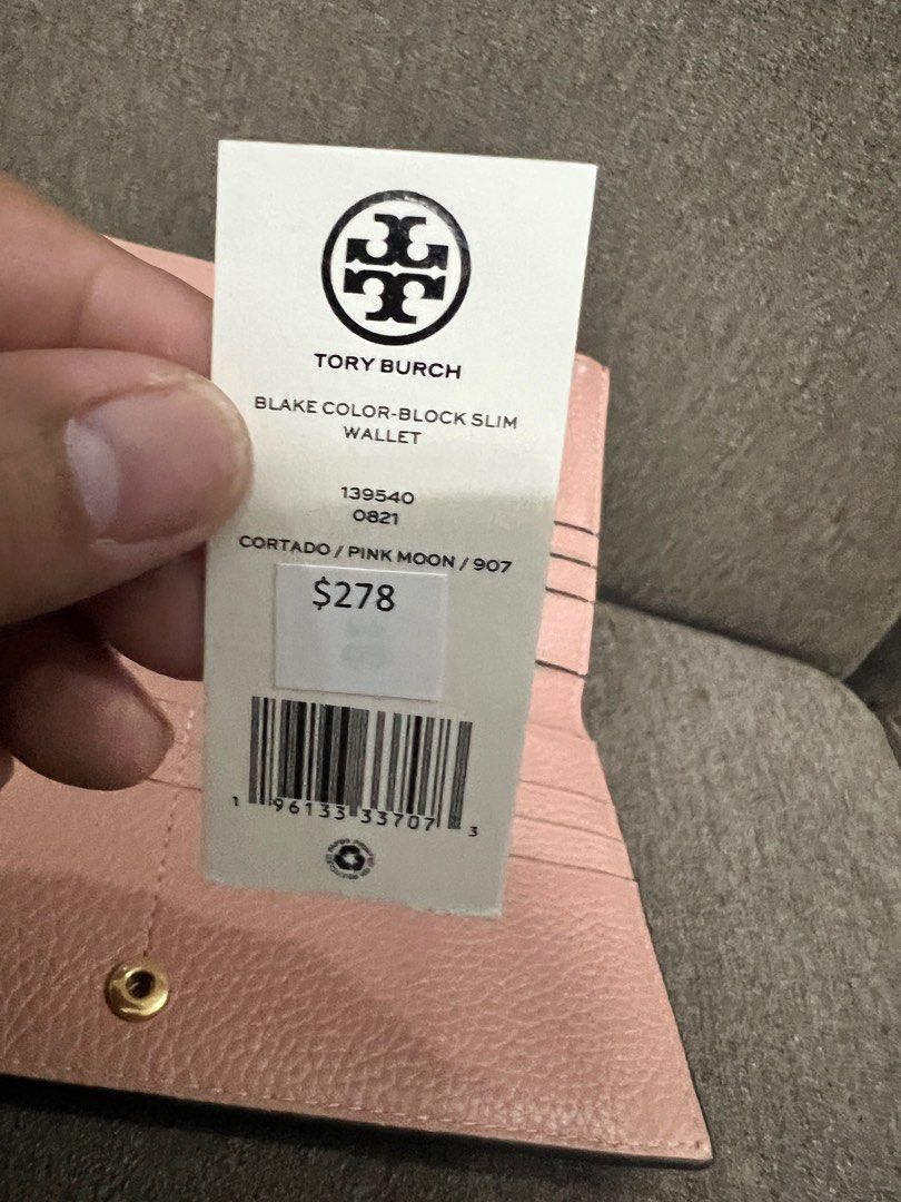 PRELOVED! Tory Burch Blake Color Block Slim Wallet (Category: Luxury Bags & Wallets) located in San Pedro. Submitted by misslumi (Listing ID 1394896722, Image 3). Description: Bought from Canada-based shopper. Used for a short time - good as new. Includes original packaging, tag and gift receipt. Please see photos. Cortado (Brown) / Pink Moon color. Very nice color combination! .
