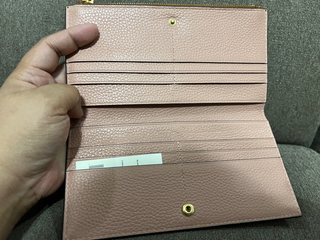 PRELOVED! Tory Burch Blake Color Block Slim Wallet (Category: Luxury Bags & Wallets) located in San Pedro. Submitted by misslumi (Listing ID 1394896722, Image 2). Description: Bought from Canada-based shopper. Used for a short time - good as new. Includes original packaging, tag and gift receipt. Please see photos. Cortado (Brown) / Pink Moon color. Very nice color combination! .