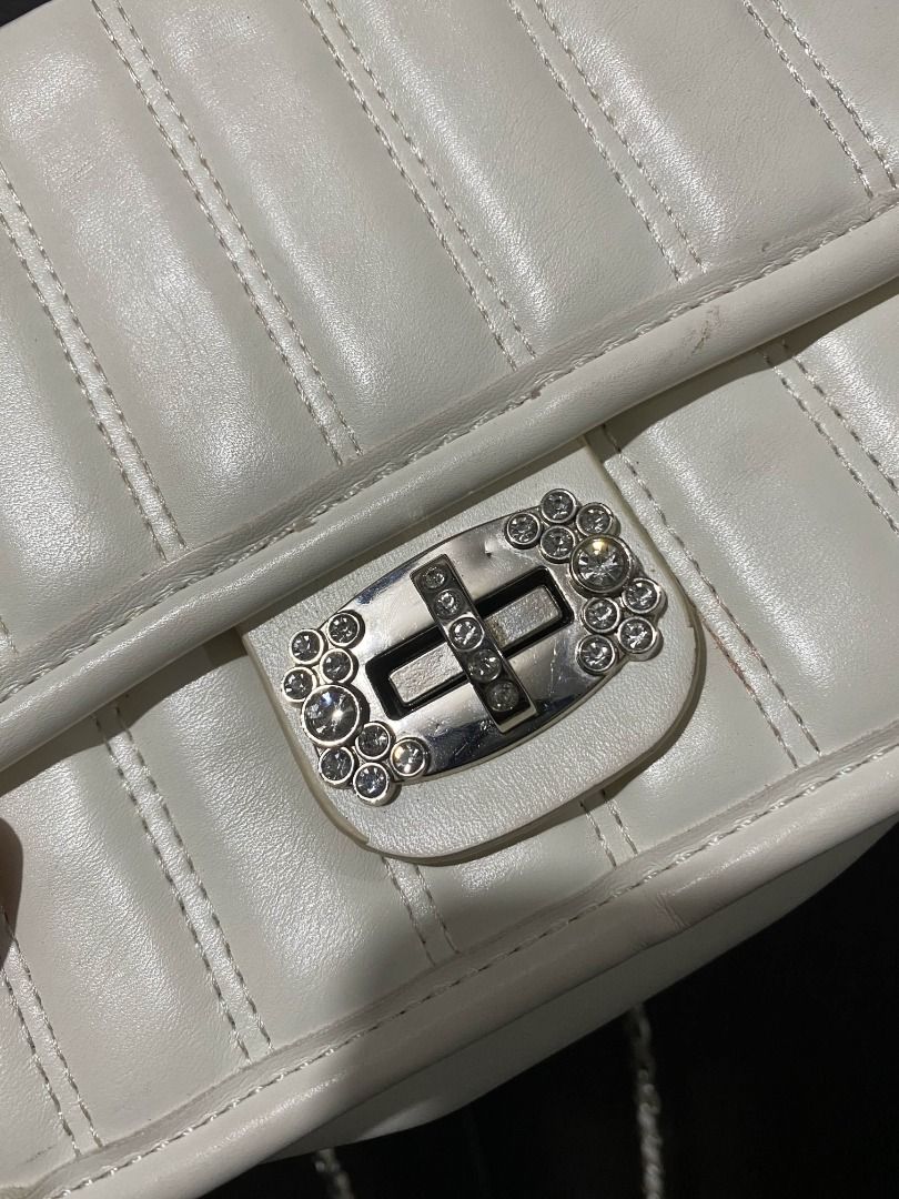 Sling Bag | Cream 2-way w/ Bling (Category: Shoulder Bags) located in Marikina City. Submitted by marisan.collection (Listing ID 1394936126, Image 3). Description: 2nd Hand Bags for sale See photos for details and as is Condition: Like new, no issue Gcash payment JNT | FLASH | LALAMOVE .