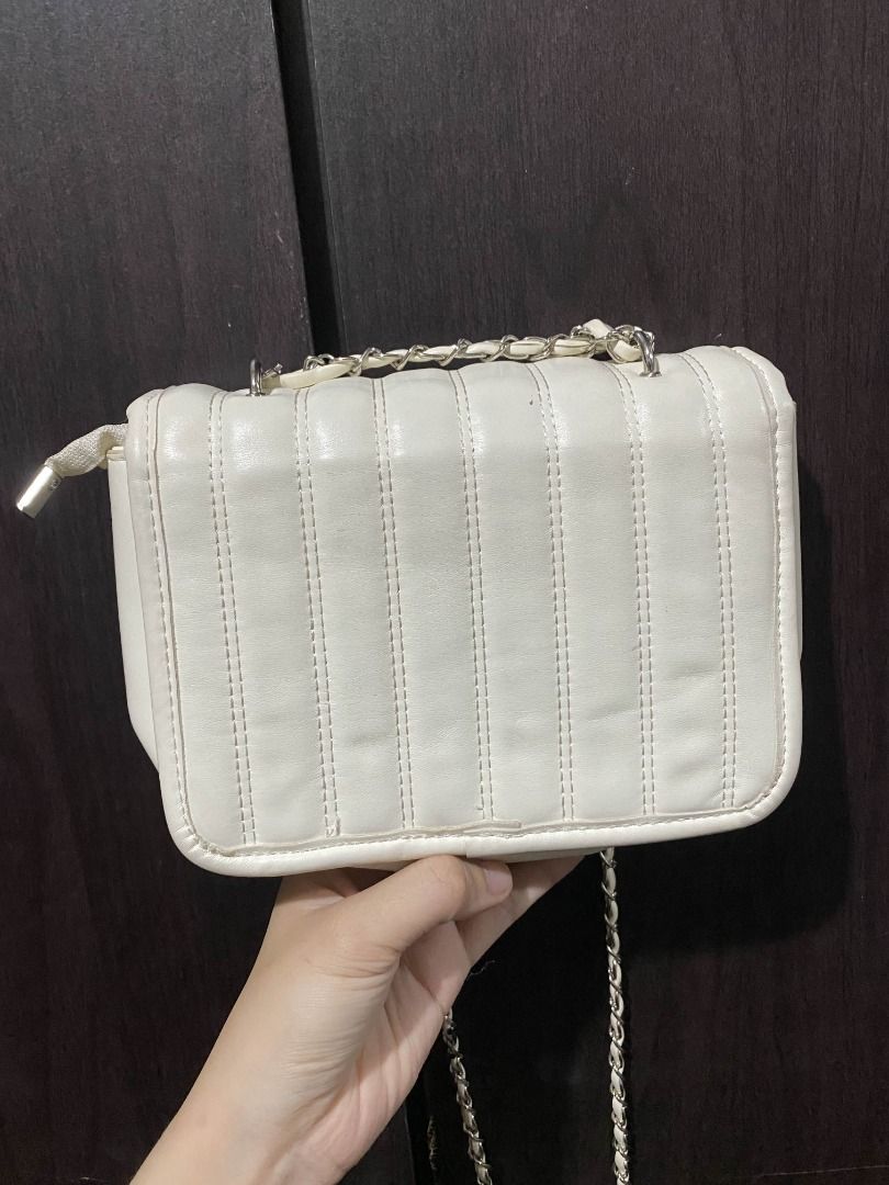 Sling Bag | Cream 2-way w/ Bling (Category: Shoulder Bags) located in Marikina City. Submitted by marisan.collection (Listing ID 1394936126, Image 2). Description: 2nd Hand Bags for sale See photos for details and as is Condition: Like new, no issue Gcash payment JNT | FLASH | LALAMOVE .