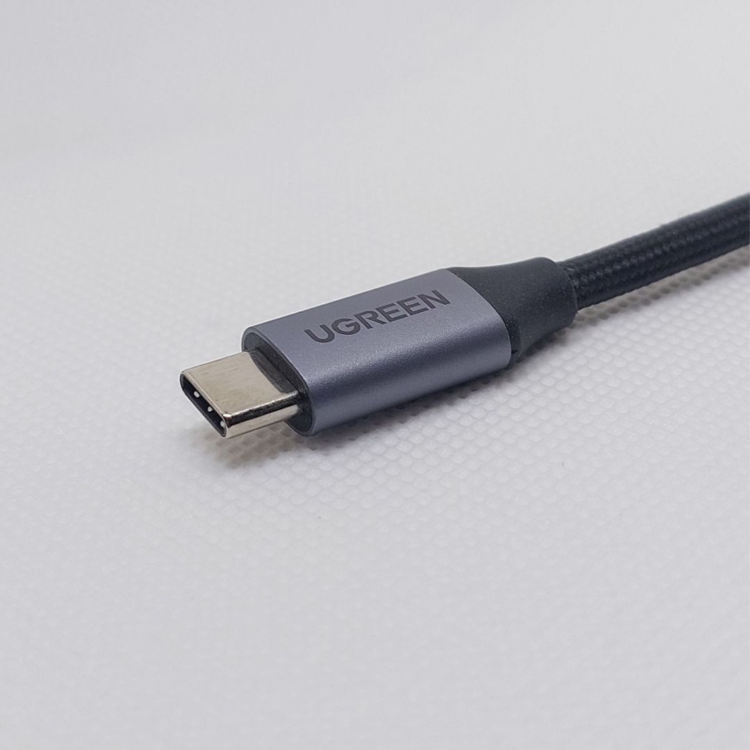 UGREEN USB-C Hub (Category: Cables & Adaptors) located in Allen. Submitted by omoriii (Listing ID 1394955825, Image 3). Description: - UGREEN USB-C Hub - Ports: USB 3.0, USB 2.0, HDMI, USB-C (Power Delivery) - Sleek gray design - Built-in cable for easy connection - Expands connectivity for laptops and tablets - Connect multiple peripherals.