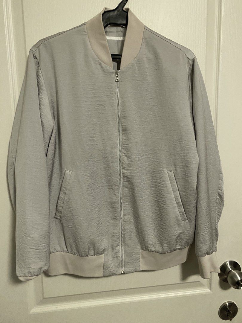 Uniqlo Gray Womens Bomber Jacket Size L (Category: Coats, Jackets and Outerwear) located in Quezon City. Submitted by kumamon31 (Listing ID 1394930945, Image 1). Description: Uniqlo Gray Womens Bomber Jacket Size L 20in width armpit to armpit.