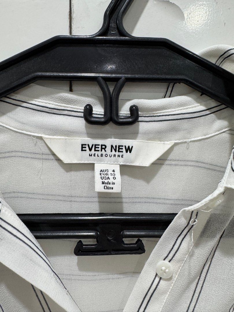 Ever New White Striped Blouse (Category: Blouses) located in Mandaluyong City. Submitted by arabeaaa (Listing ID 1394917120, Image 2). Description: - Still in good condition - Brand: Ever New - Can fit XXS and XS - RFS: decluttering .