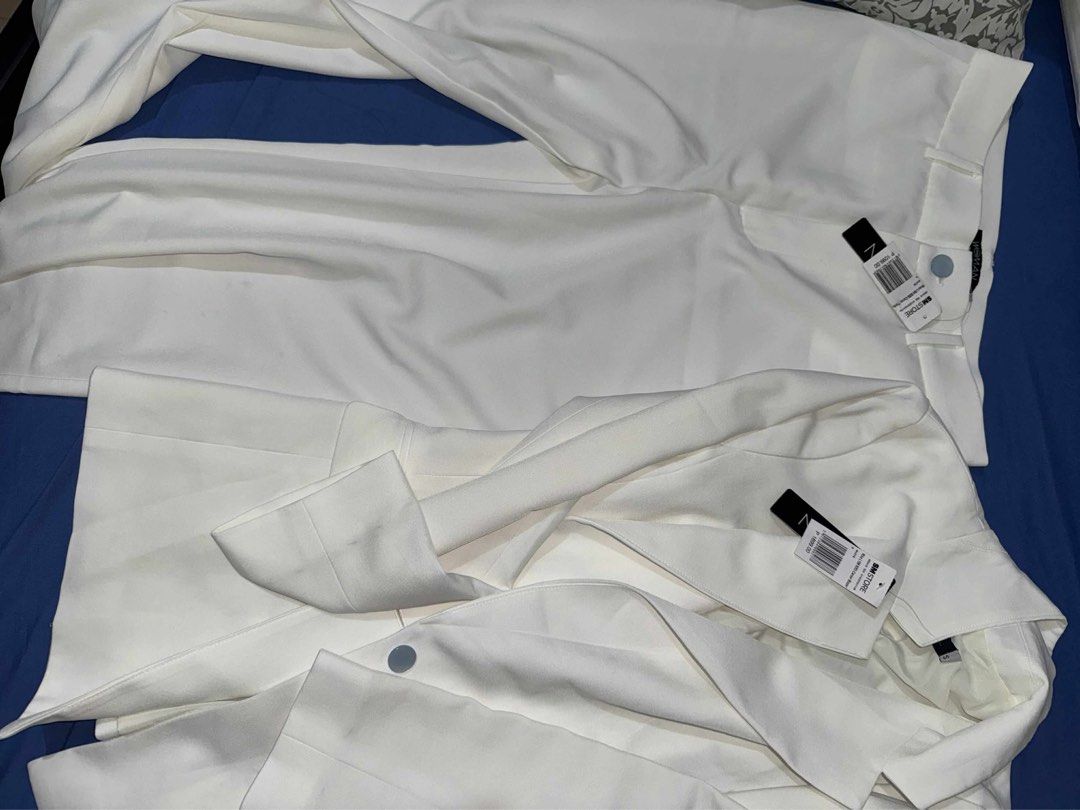White suit coordinate coat and pants (Category: Sets or Coordinates) located in Pasig City. Submitted by repeatrenters (Listing ID 1394920314, Image 3). Description: Originally 3k. Price negotiable. Was supposed to be for a civil wedding, but wore dress instead..
