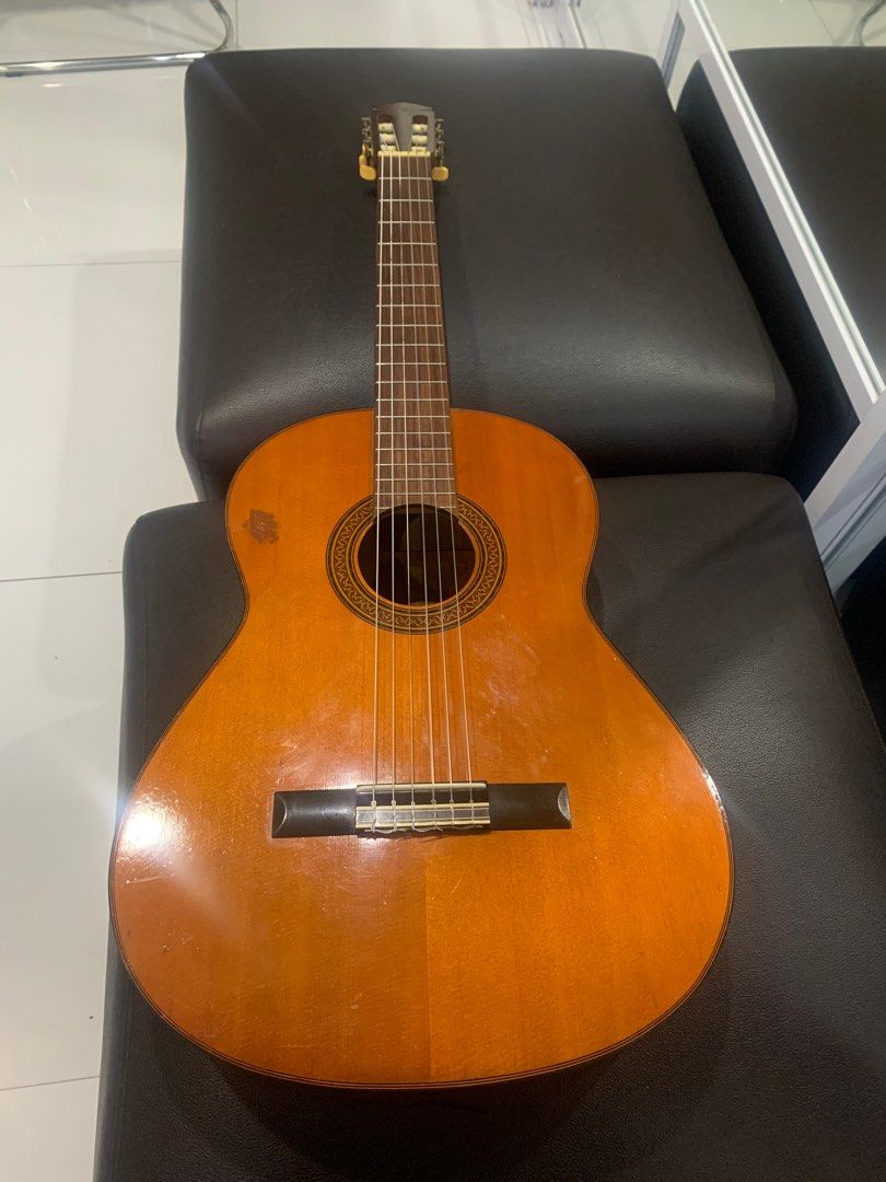 Yamaha G-100D classical guitar (Category: Musical Instruments) located in Makati City. Submitted by gotsgoods2022 (Listing ID 1394844099, Image 2). Description: - Vintage (1977) Yamaha G-100D nippon gakki. GOLD LABEL - superb sound - steal price!! .