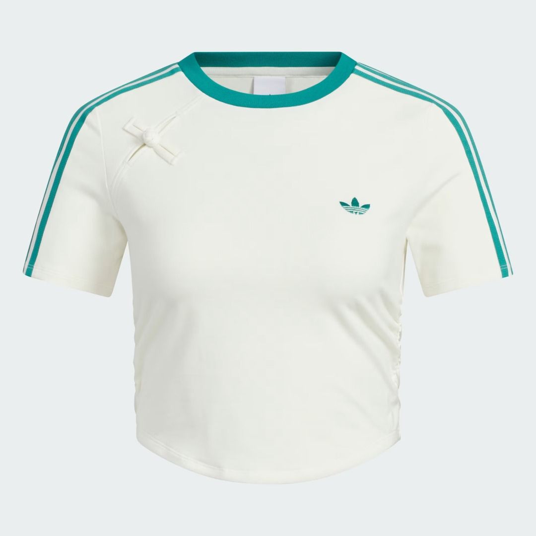 Adidas Classic Chinese New Year Tee (Category: Shirts) located in Makati City. Submitted by pulsepop.ph (Listing ID 1395082720, Image 3). Description: XS-XL Made from soft single jersey fabric, this adidas Chinese New Year t-shirt is a classic, comfortable style. The contrast-colour 3-Stripes, Trefoil and crewneck collar give it a clean, slightly retro vibe. The slim fit hugs your body for a sleek look. Colour: Off White / Pure Teal.