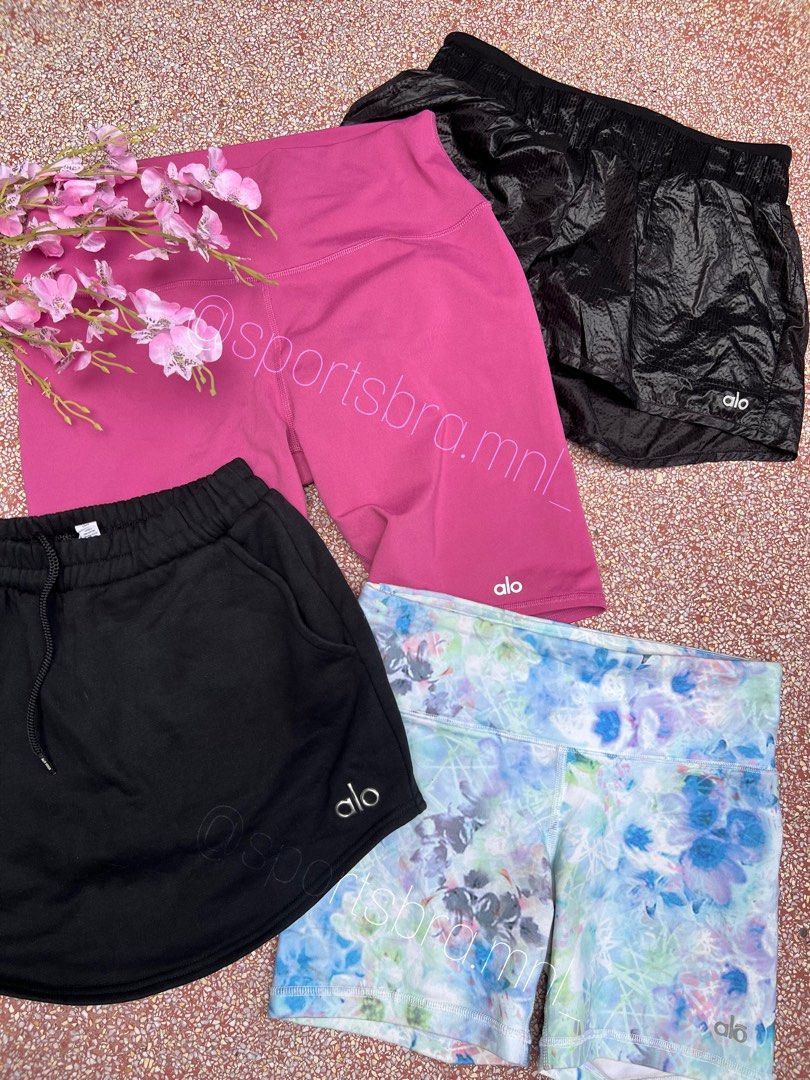 Alo Yoga Shorts (Category: Activewear) located in Taguig. Submitted by sbmanilaaa (Listing ID 1395157389, Image 1). Description: - Alo Yoga shorts collection. - Includes: - Black shorts with pockets and drawstring. - Pink high-waisted shorts. - Floral print shorts. - All shorts feature the Alo logo..