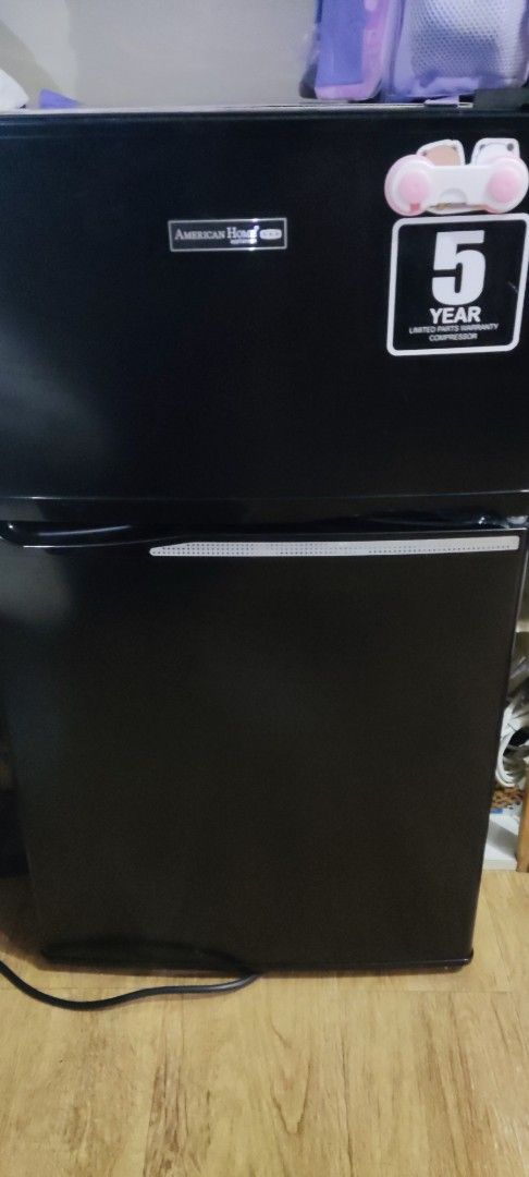 American Home 2-Door Refrigerator (Category: Refrigerators and Freezers) located in Pasig City. Submitted by bblossom21 (Listing ID 1394986635, Image 1). Description: - American Home 2-door refrigerator - Sleek black exterior - 90L gross volume - 220V, 60Hz - Includes shelves and door compartments - 5-year limited parts warranty on compressor - Model: ABR-8802D.
