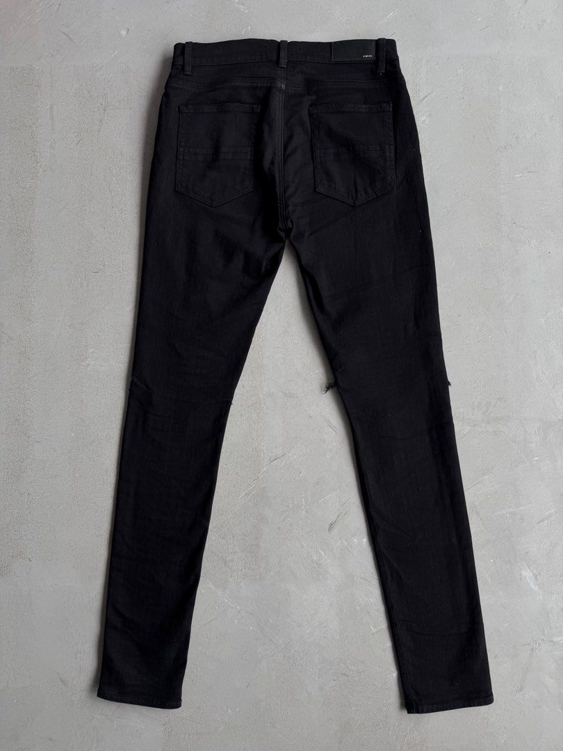 Amiri Black Distressed Skinny Jeans (Category: Activewear) located in Santa Rosa. Submitted by beyondarchives (Listing ID 1395026549, Image 2). Description: Size: 44 Width: 32 Length: 46 Leg Opening: 6 Materials: Cotton Condition: 9/10 Issue: None.