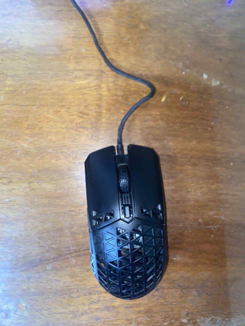 Asus TUF M4 Air Wired Gaming Mouse (Category: Mouse & Mousepads) located in Manila. Submitted by dnoxiao (Listing ID 1395126410, Image 1). Description: **Condition:** Barely used, fully functional. No box or accessories included, only the mouse itself— although it will be presented to you in a box (plain) upon delivery. Originally bought at ₱2,750 * Ultralight design (only 47g) for faster and smoother movement * Ambidextrous form, comfortable for