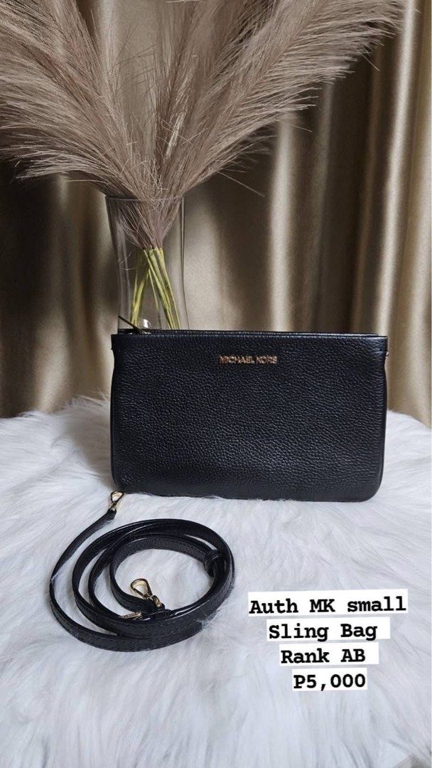 Auth MK Sling/Clutch Bag (Category: Luxury Bags & Wallets) located in Pasay City. Submitted by 2ndloveforever2023 (Listing ID 1395068327, Image 1). Description: Guaranteed auth No flaws.