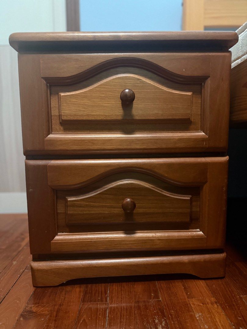 Bedside Table Solid Wood (Category: Tables & Sets) located in Singapore. Submitted by reesaas (Listing ID 1395092096, Image 3). Description: - Classic wooden nightstand - Two drawers for storage - Warm, natural wood finish - Smooth corners, safe edges - Smooth drawer operation - Solid and sturdy construction L43 x W44 x H51 cm Self-pickup or arrange own delivery.
