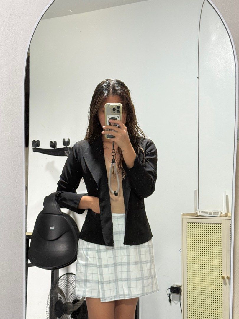 Black Blazer (Category: Coats, Jackets and Outerwear) located in Mandaluyong City. Submitted by quickriver.c73050 (Listing ID 1395024785, Image 2). Description: - Classic black blazer - Notched lapel - Two-button closure - Long sleeves - Tailored fit - Smooth, woven fabric - Suitable for casual and formal occasions.