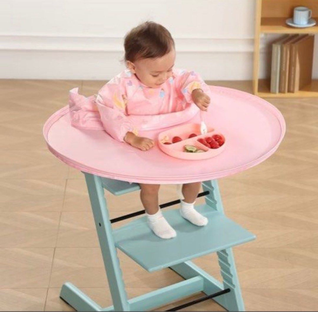 BLW Waterproof Large Tray Baby Chair Cover Tray Mat and Bib for Stokke (Category: Weaning & Toddler Feeding) located in Singapore. Submitted by jordanleech (Listing ID 1394980040, Image 1). Description: Great to use when starting Baby Led weaning self feeding. To ensure the baby doesn’t drop all the food and allow them enough space to explore and get messy when eating. Baby dining table set includes a round tray, a bib, and a storage bag The solu