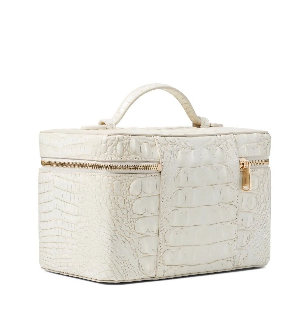 Brahmin Cosmetic Bag (Category: Luxury Bags & Wallets) located in Quezon City. Submitted by dymc25 (Listing ID 1395106000, Image 3). Description: Brand New Original Product details Brahmin's Charmaine is a must-have travel makeup bag. This structured train case offers plenty of space for your cosmetics and toiletries. Use the interior elastic pocket to keep brushes and other items in place. A wide zip-around opening makes it easy to retrieve make